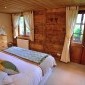 Chalet Cannelle Capra bedroom, super king or twin, balcony & mountain views, ensuite shower room